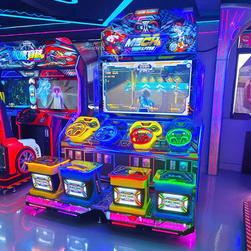 Khu trưng bày máy chơi game với ánh sáng neon xanh tím bao quanh, ghế lái đa màu và màn hình lớn hiển thị cảnh đua xe Khu trưng bày máy chơi game với ánh sáng neon xanh tím bao quanh, ghế lái đa màu và màn hình lớn hiển thị cảnh đua xe