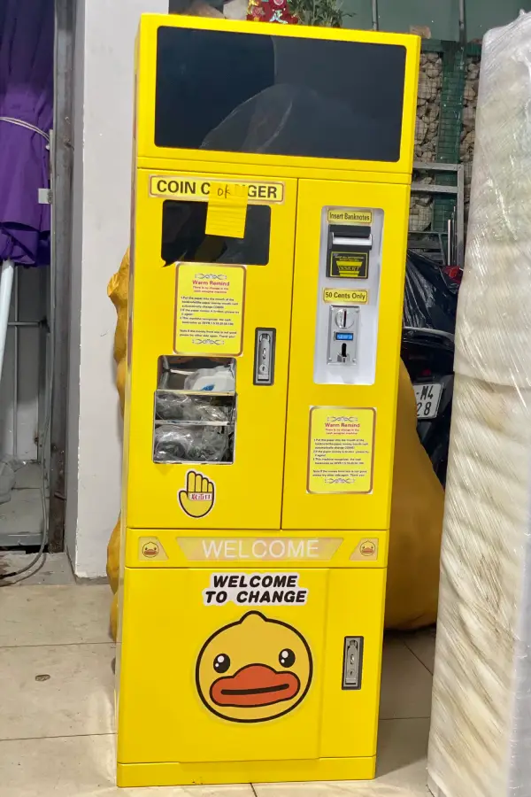 máy bán xu tự động màu vàng 600 900