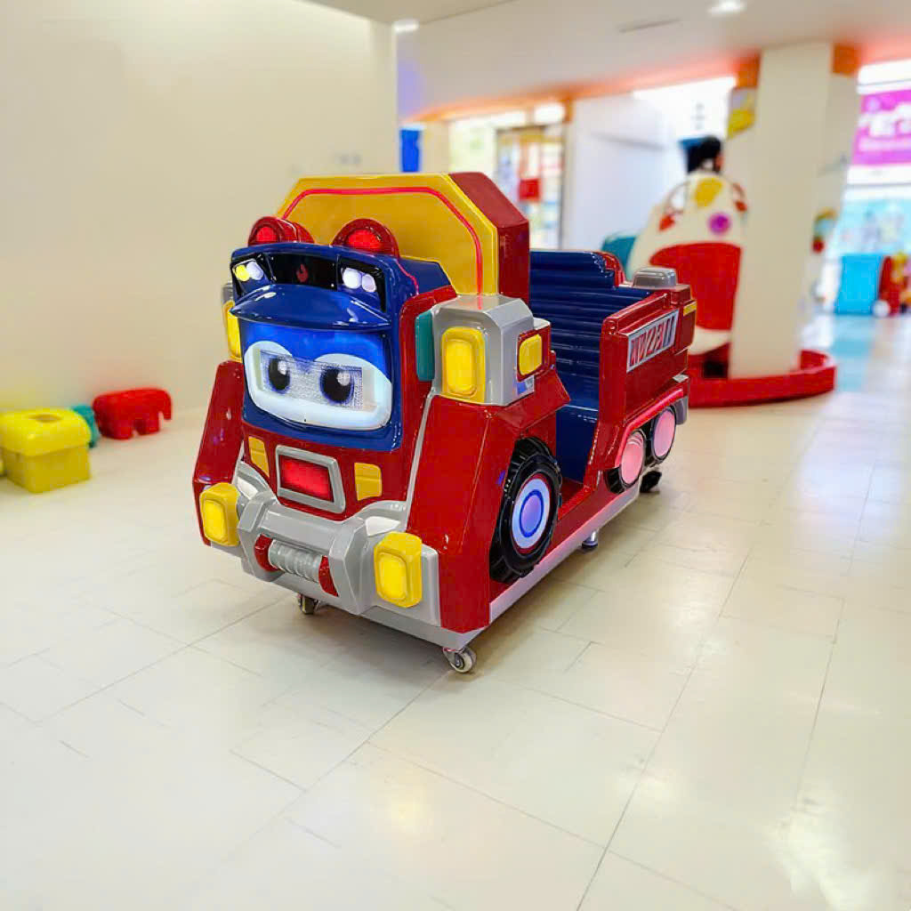 Thiết bị trò chơi nhún điện xe cứu hỏa tích hợp màn hình tương tác.