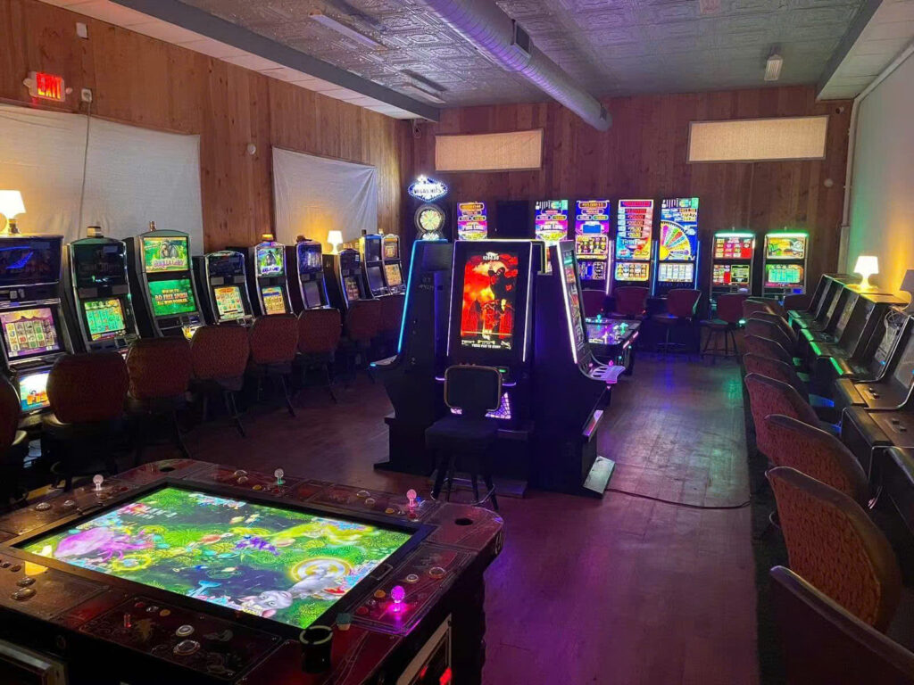 Busy arcade center with modern LED lighting and game machines