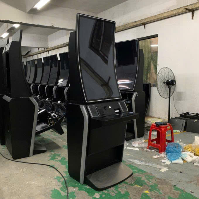 Curved Touchscreen Arcade Machine Attracting Customers